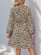 Perfee Printed Tie Neck Long Sleeve Mini Dress - Delanoir