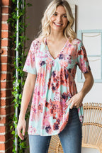 Heimish Full Size Floral V-Neck Short Sleeve Babydoll Blouse - Delanoir