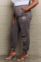 Simply Love Simply Love Full Size Drawstring DAISY Graphic Long Sweatpants - Delanoir