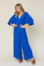 Double Take Full Size Surplice Wide Leg Jumpsuit with Pockets - Delanoir
