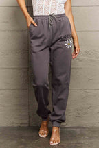 Simply Love Simply Love Full Size Drawstring DAISY Graphic Long Sweatpants - Delanoir
