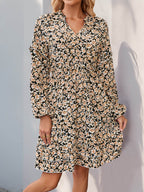 Perfee Printed Tie Neck Long Sleeve Mini Dress - Delanoir