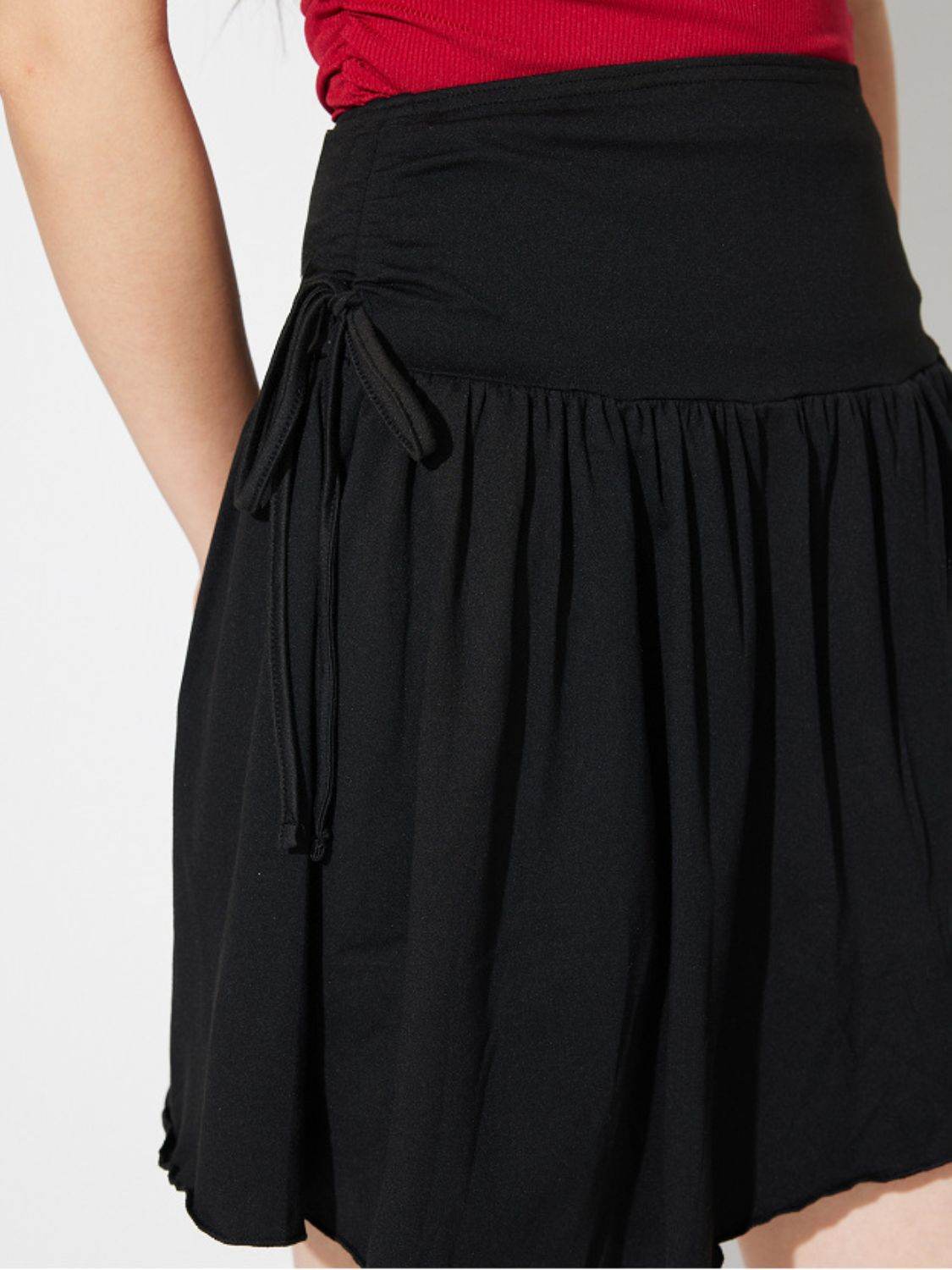 Side Tie Asymmetric Hem Mini Skirt - Delanoir