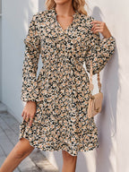 Perfee Printed Tie Neck Long Sleeve Mini Dress - Delanoir