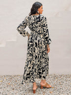 Smocked Printed Tie Neck Long Sleeve Dress - Delanoir