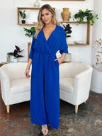 Double Take Full Size Surplice Wide Leg Jumpsuit with Pockets - Delanoir