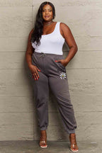 Simply Love Simply Love Full Size Drawstring DAISY Graphic Long Sweatpants - Delanoir