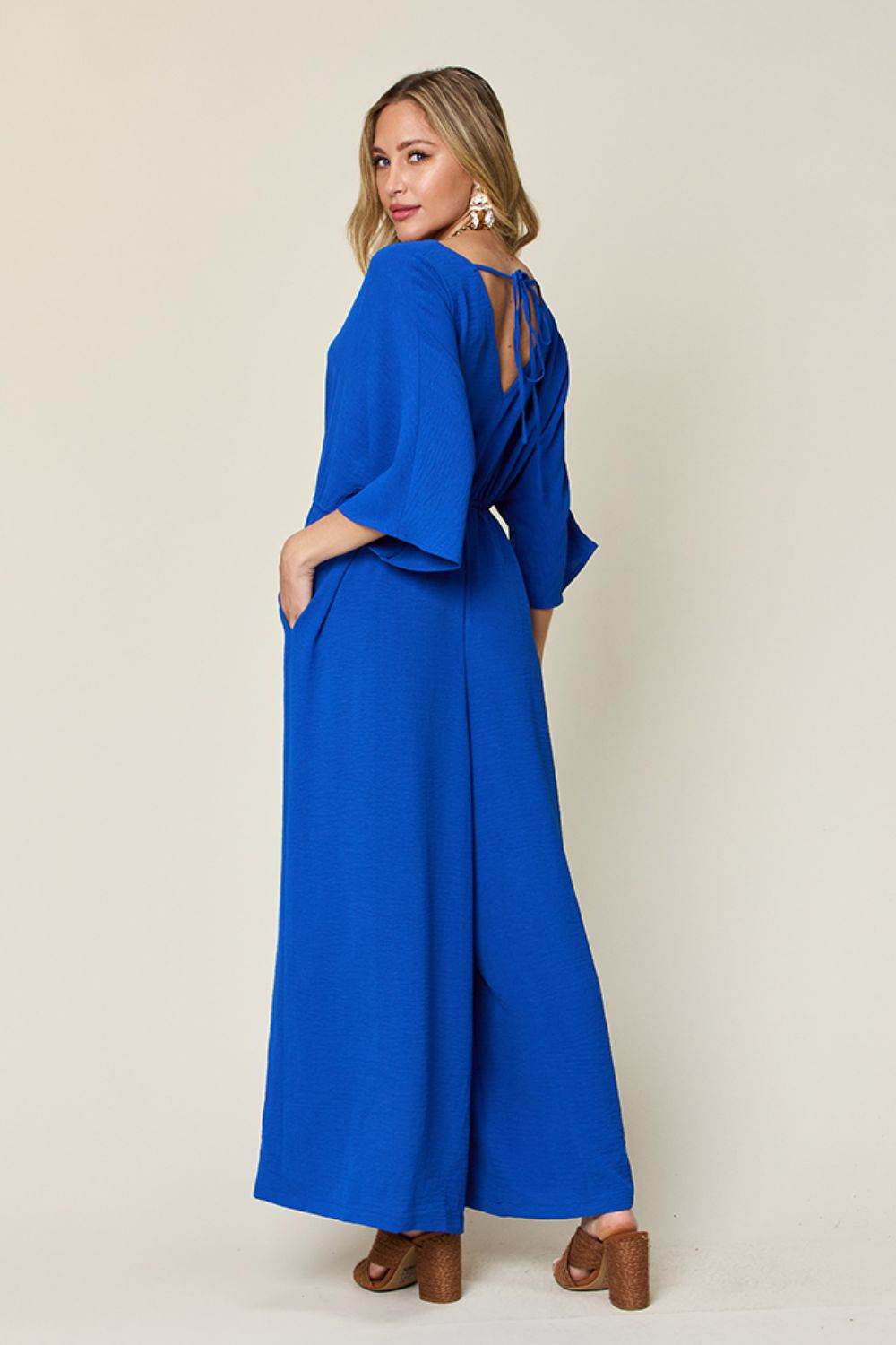 Double Take Full Size Surplice Wide Leg Jumpsuit with Pockets - Delanoir