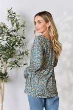 Heimish Full Size Floral Half Button Long Sleeve Blouse - Delanoir
