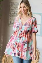 Heimish Full Size Floral V-Neck Short Sleeve Babydoll Blouse - Delanoir